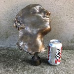 Bronze face sculpture
